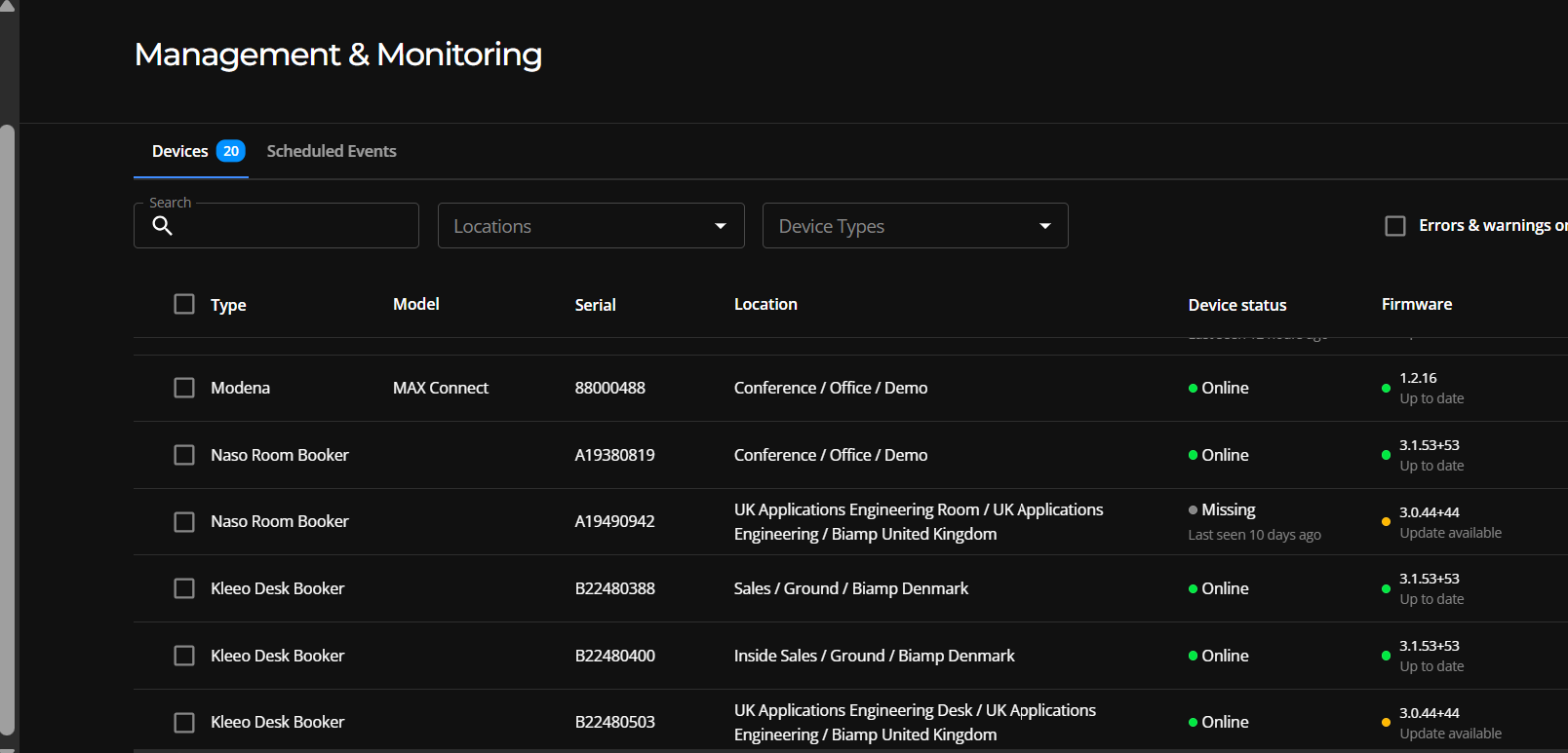 The Biamp Workplace portal showing the Devices page with added booking devices.